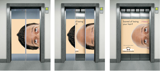 育毛剤（Folliderm）のエレベーター広告。髪を失うのが怖く感じたら「医師に相談しよう」とのことです。解りやすいですね。＜インド＞