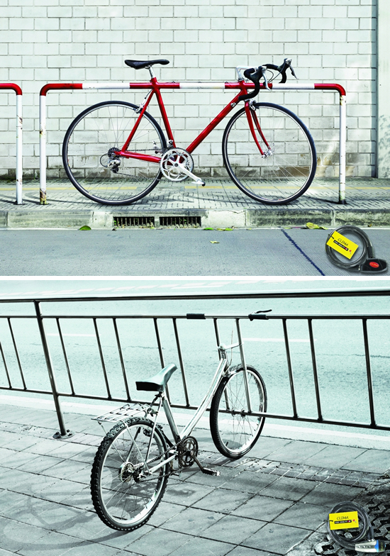 自転車用ロック（Clima Bicycle Lock）の販促ポスター。道路の設備と融合してしまうくらいの堅牢さをアピールしています。＜タイ＞