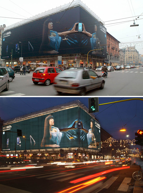 携帯端末（モトローラ）の屋外広告。ミラノのブエノスアイレス通りで展開された昼と夜でそれぞれ違った表情を見せる3D広告。＜イタリア＞