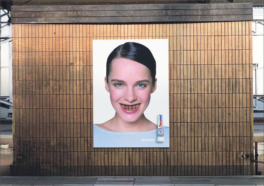 歯磨き粉の屋外広告。切り取られた口の部分が虫歯に見えます（笑）。モデルさんは複雑な心境ですね。＜ドイツ＞