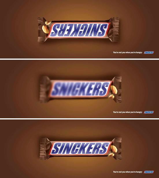 お菓子（Snickers）の販促ポスター。劣化、逆さま、スペルミス・・・など、空腹のあまり意識が混濁する前に早く食べましょう。という感じですね。＜イギリス ＞